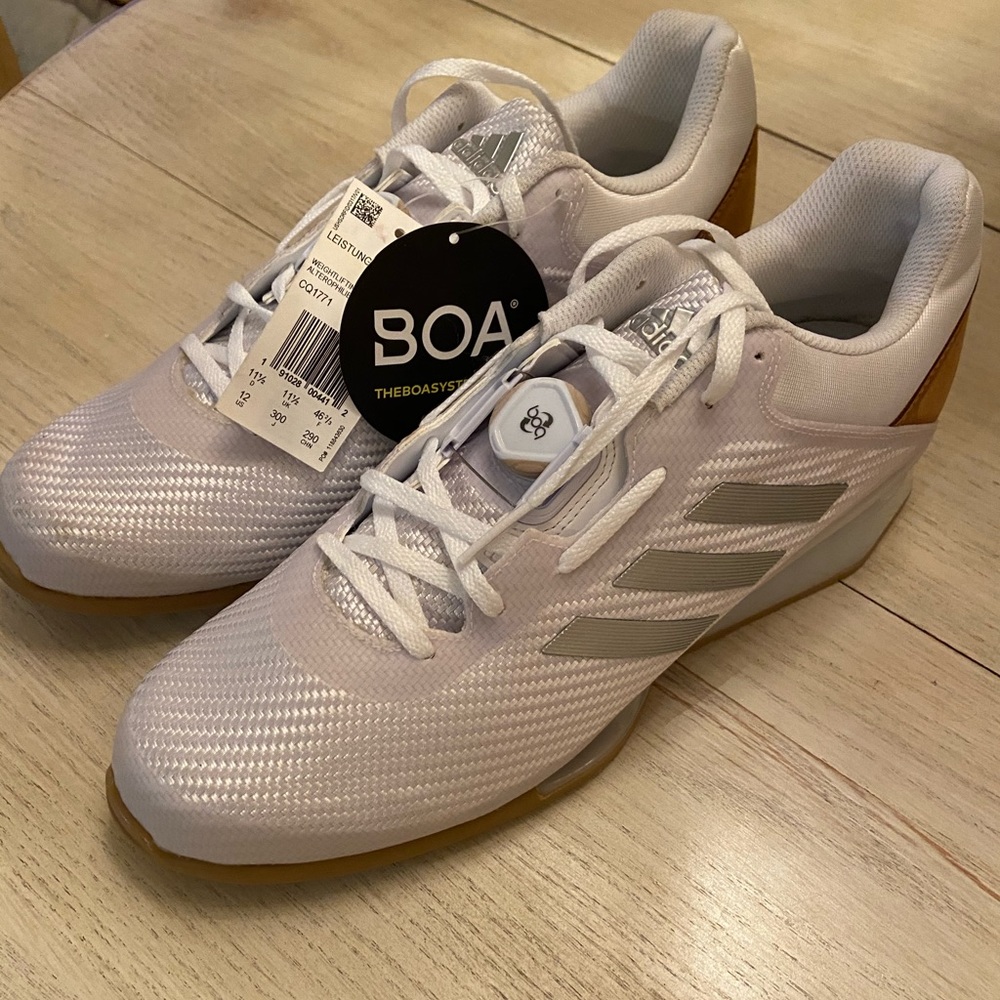 Men’s white adidas shoes